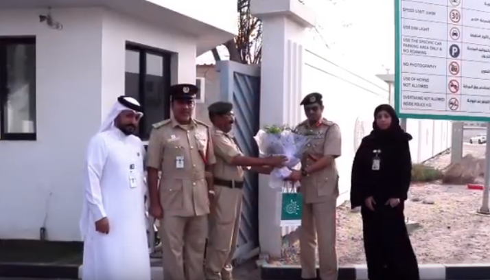 Dubai Police random act of kindness salute welcome smile